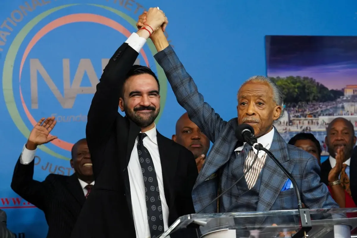 Zohran Mamdani speaking at a campaign event