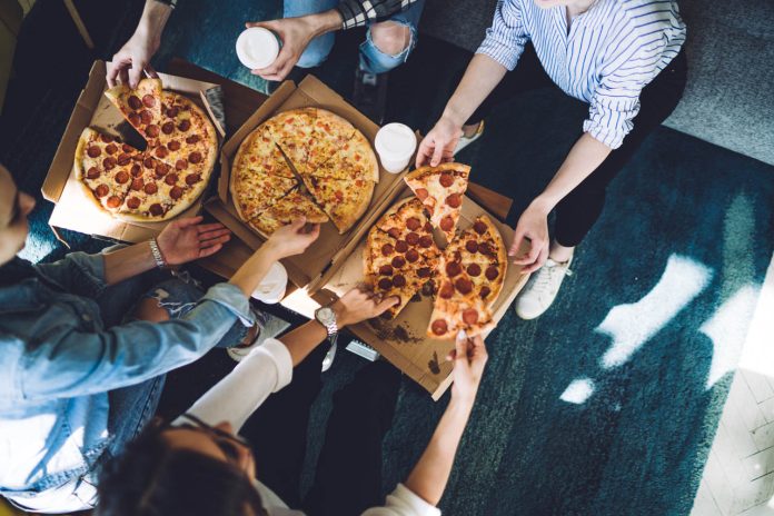 People eating pizza