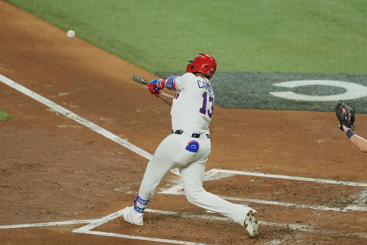 Junior Caminero hitting a record-breaking home run for the Dominican Republic in the World Baseball Classic.