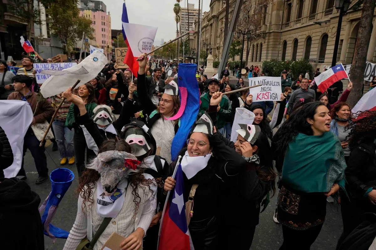 Protesters marching in Santiago Chile during World Water Day demonstrations