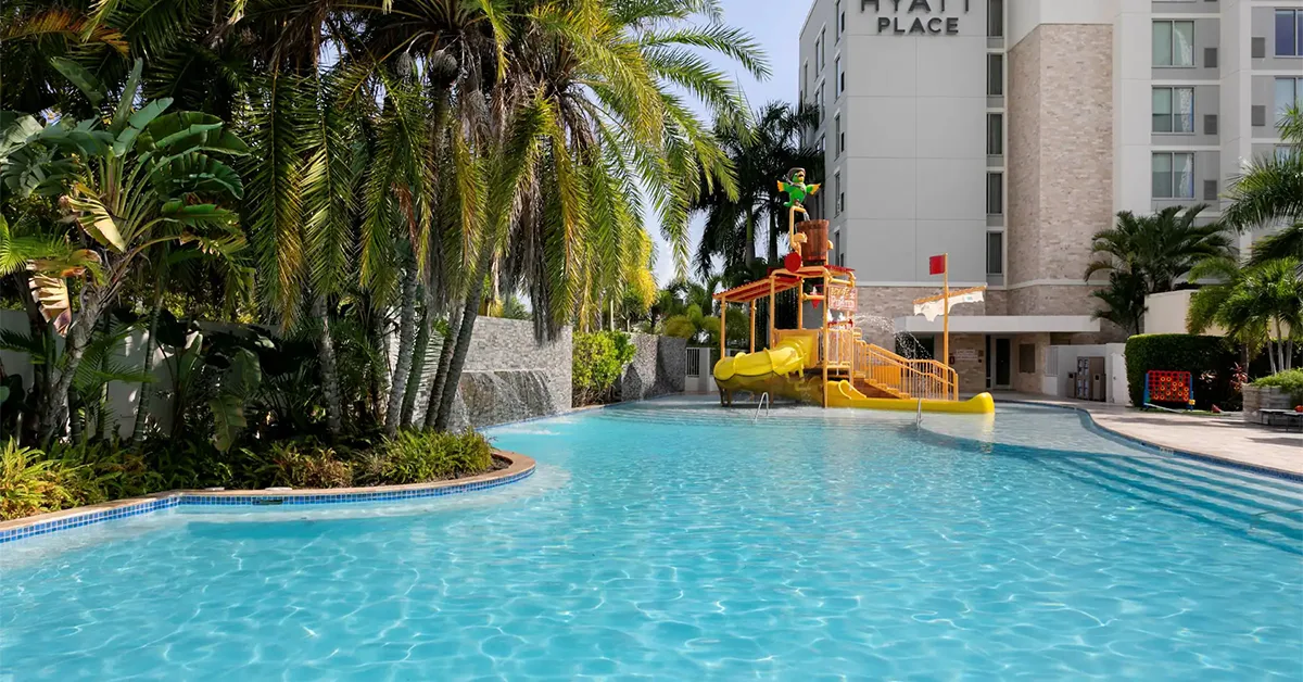 Hyatt Place San Juan hotel exterior with pool area